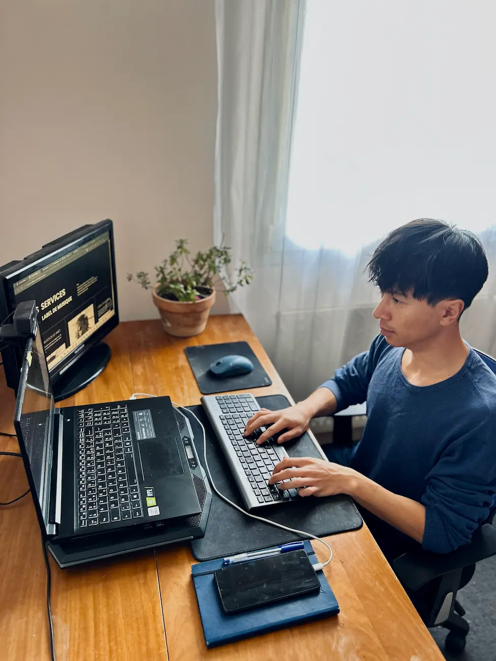 Jean-Baptiste Servais working on web development projects